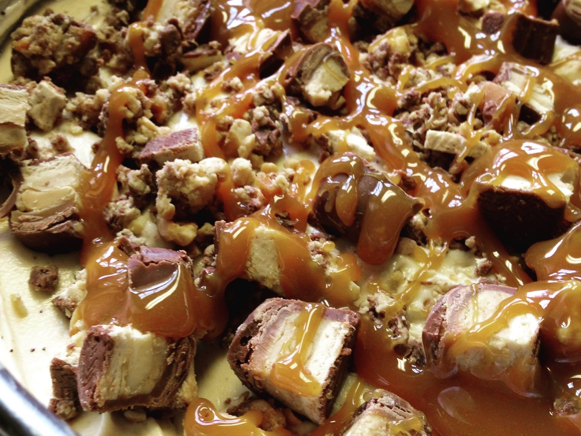 Peanut Butter Snickers Cheesecake